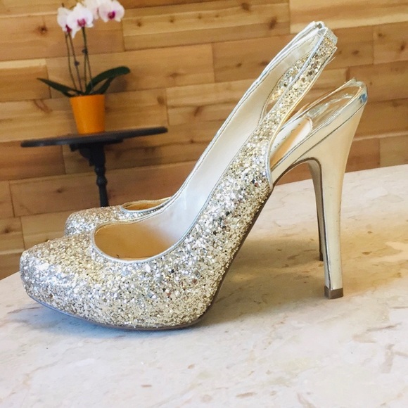 Ivanka Trump Shoes - Ivanka Trump gold glitter platform pumps